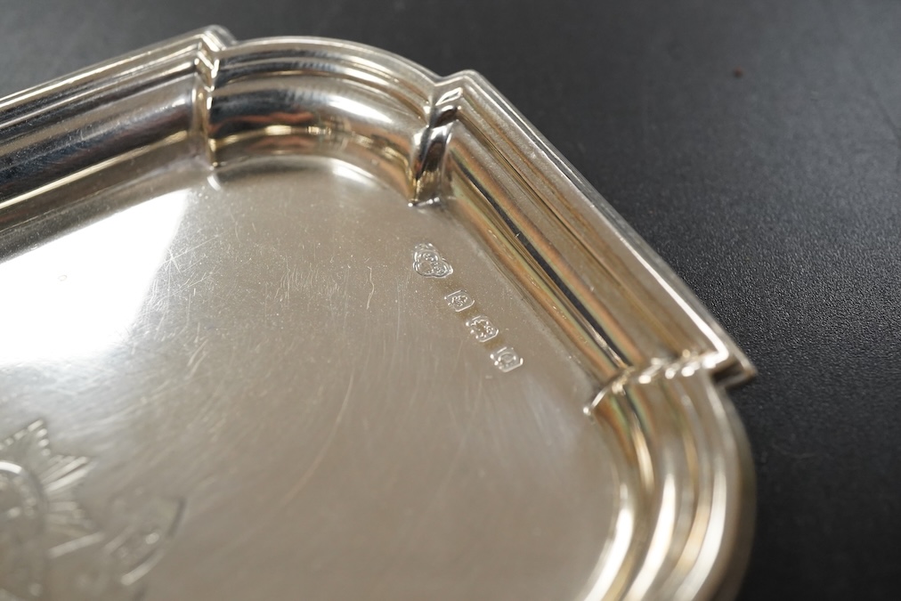 A pair of late Victorian Regimental silver menu holders (Royal Sussex Regiment), a pair of ashtrays and two pairs of uniform pips first height 5cm., weight approx. 7.83ozt